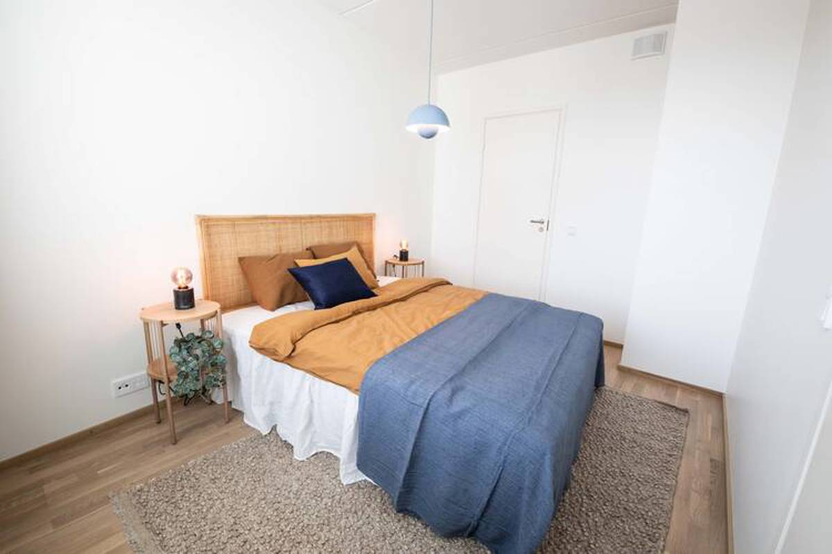 Valokuva asunnon B61 kalustetusta makuuhuoneesta