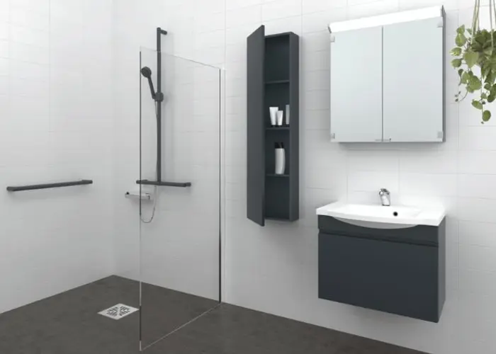 Kuva kylpyhuonesta, jossa harmaan sävyinen kalustus ja tuki kannake seinässä